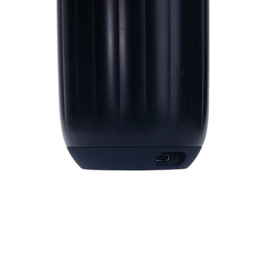 a close up of a black object on a white background